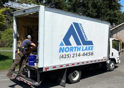 Roofer unloading and setting up on a project in Lynnwood, wa